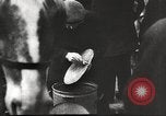 Image of European children and adults scavenge for food and relief after war Europe, 1945, second 34 stock footage video 65675063144
