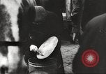 Image of European children and adults scavenge for food and relief after war Europe, 1945, second 36 stock footage video 65675063144
