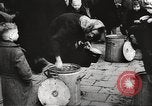 Image of European children and adults scavenge for food and relief after war Europe, 1945, second 37 stock footage video 65675063144