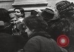 Image of European children and adults scavenge for food and relief after war Europe, 1945, second 44 stock footage video 65675063144