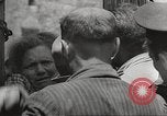 Image of European children and adults scavenge for food and relief after war Europe, 1945, second 50 stock footage video 65675063144