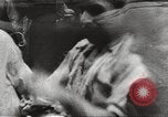 Image of European children and adults scavenge for food and relief after war Europe, 1945, second 60 stock footage video 65675063144