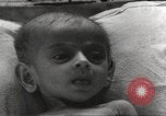 Image of European children and adults scavenge for food and relief after war Europe, 1945, second 62 stock footage video 65675063144