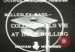 Image of hoop-rolling contest Wellesley Massachusetts USA, 1933, second 1 stock footage video 65675063201