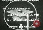 Image of hoop-rolling contest Wellesley Massachusetts USA, 1933, second 4 stock footage video 65675063201