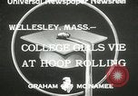 Image of hoop-rolling contest Wellesley Massachusetts USA, 1933, second 5 stock footage video 65675063201