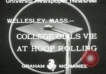 Image of hoop-rolling contest Wellesley Massachusetts USA, 1933, second 7 stock footage video 65675063201