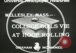 Image of hoop-rolling contest Wellesley Massachusetts USA, 1933, second 9 stock footage video 65675063201