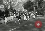 Image of hoop-rolling contest Wellesley Massachusetts USA, 1933, second 16 stock footage video 65675063201