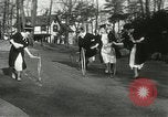 Image of hoop-rolling contest Wellesley Massachusetts USA, 1933, second 34 stock footage video 65675063201