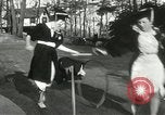 Image of hoop-rolling contest Wellesley Massachusetts USA, 1933, second 36 stock footage video 65675063201
