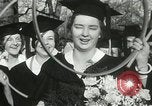 Image of hoop-rolling contest Wellesley Massachusetts USA, 1933, second 45 stock footage video 65675063201