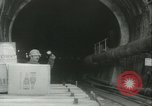 Image of "Holing through" of tunnel in Mont Blanc Europe, 1962, second 16 stock footage video 65675063219