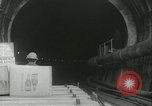 Image of "Holing through" of tunnel in Mont Blanc Europe, 1962, second 18 stock footage video 65675063219
