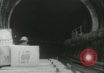 Image of "Holing through" of tunnel in Mont Blanc Europe, 1962, second 19 stock footage video 65675063219