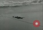 Image of search for Amelia Earhart after she disappears.  Oakland California USA, 1937, second 27 stock footage video 65675063220