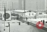 Image of Friedrichstrasse checkpoint of Berlin Wall Berlin Germany, 1961, second 62 stock footage video 65675063223