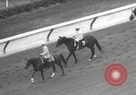 Image of horse racing United States USA, 1964, second 7 stock footage video 65675063245