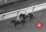 Image of horse racing United States USA, 1964, second 9 stock footage video 65675063245