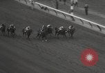 Image of horse racing United States USA, 1964, second 16 stock footage video 65675063245