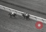 Image of horse racing United States USA, 1964, second 29 stock footage video 65675063245
