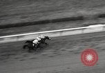 Image of horse racing United States USA, 1964, second 37 stock footage video 65675063245