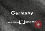 Image of tree-chopping and sawing contest Bavaria Germany, 1967, second 4 stock footage video 65675063266