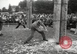 Image of tree-chopping and sawing contest Bavaria Germany, 1967, second 7 stock footage video 65675063266