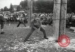 Image of tree-chopping and sawing contest Bavaria Germany, 1967, second 8 stock footage video 65675063266