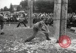 Image of tree-chopping and sawing contest Bavaria Germany, 1967, second 9 stock footage video 65675063266