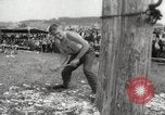 Image of tree-chopping and sawing contest Bavaria Germany, 1967, second 10 stock footage video 65675063266