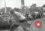 Image of tree-chopping and sawing contest Bavaria Germany, 1967, second 25 stock footage video 65675063266