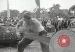 Image of tree-chopping and sawing contest Bavaria Germany, 1967, second 26 stock footage video 65675063266