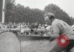 Image of tree-chopping and sawing contest Bavaria Germany, 1967, second 27 stock footage video 65675063266