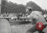 Image of tree-chopping and sawing contest Bavaria Germany, 1967, second 29 stock footage video 65675063266