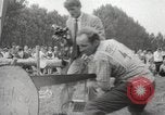 Image of tree-chopping and sawing contest Bavaria Germany, 1967, second 31 stock footage video 65675063266