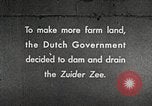 Image of dam on Zuider Zee Netherlands, 1940, second 1 stock footage video 65675063271