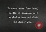 Image of dam on Zuider Zee Netherlands, 1940, second 4 stock footage video 65675063271