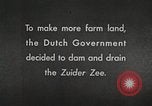 Image of dam on Zuider Zee Netherlands, 1940, second 5 stock footage video 65675063271