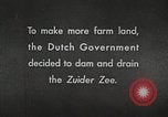 Image of dam on Zuider Zee Netherlands, 1940, second 7 stock footage video 65675063271