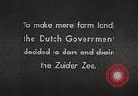 Image of dam on Zuider Zee Netherlands, 1940, second 9 stock footage video 65675063271