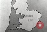Image of dam on Zuider Zee Netherlands, 1940, second 16 stock footage video 65675063271