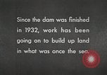 Image of dam on Zuider Zee Netherlands, 1940, second 32 stock footage video 65675063271