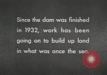 Image of dam on Zuider Zee Netherlands, 1940, second 34 stock footage video 65675063271