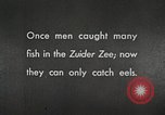 Image of dam on Zuider Zee Netherlands, 1940, second 59 stock footage video 65675063271