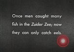 Image of dam on Zuider Zee Netherlands, 1940, second 60 stock footage video 65675063271