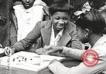 Image of African American children playing games New York United States USA, 1935, second 38 stock footage video 65675063275