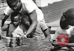 Standbild Negro Kinder New York United States USA, 1935, aus Sekunde 5 historischem Filmmaterial Videoclip 65675063278