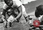 Standbild Negro Kinder New York United States USA, 1935, aus Sekunde 6 historischem Filmmaterial Videoclip 65675063278