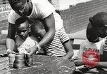 Standbild Negro Kinder New York United States USA, 1935, aus Sekunde 7 historischem Filmmaterial Videoclip 65675063278